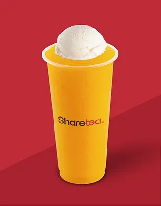 Yellow Sharetea cup with a scoop of vanilla ice cream on a red background