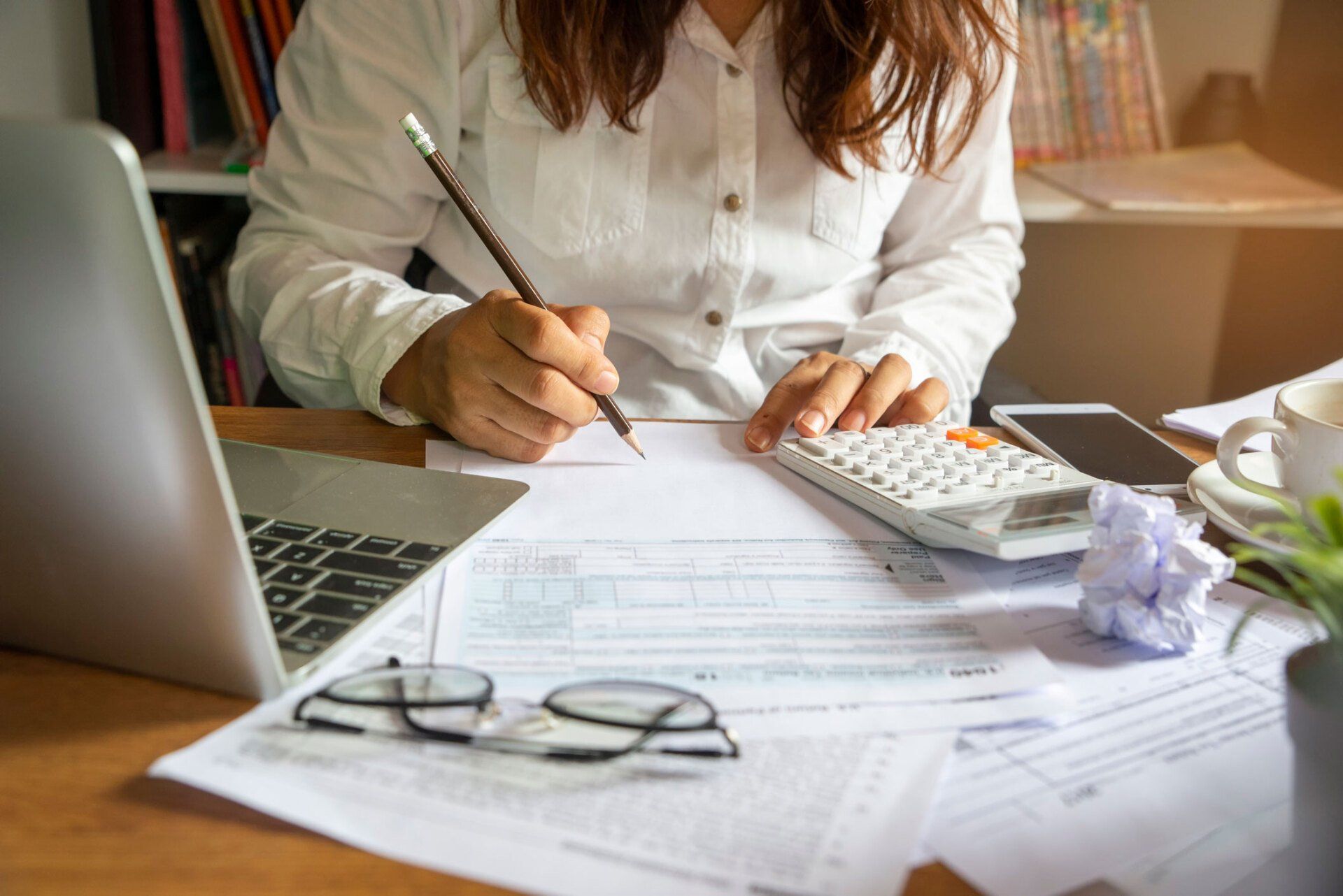 Woman Computing Taxes — Wilmington, NC — Accounting By Jerry