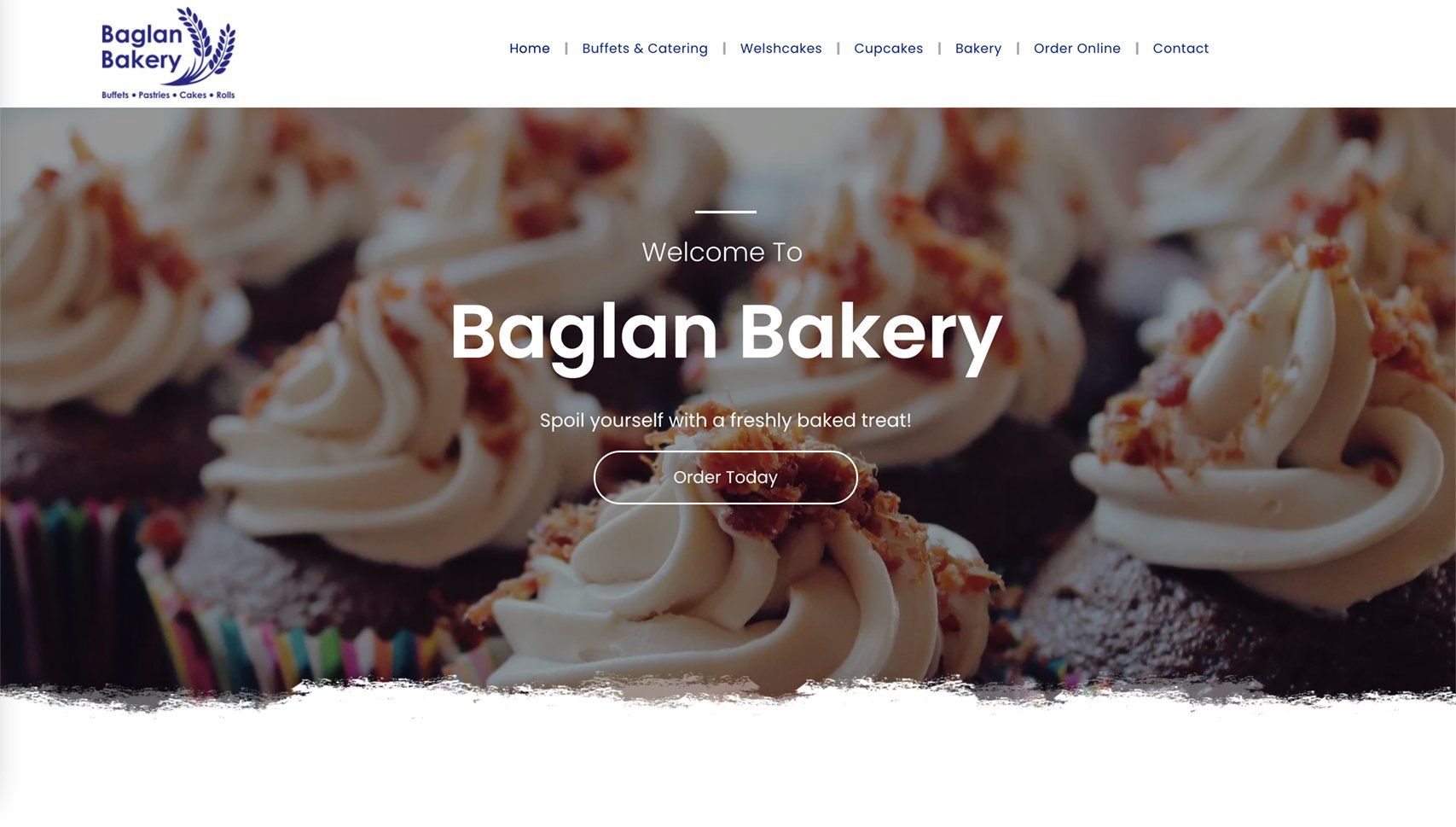 Baglan Bakery homepage banner with cupcake frosting close-up and bakery branding text