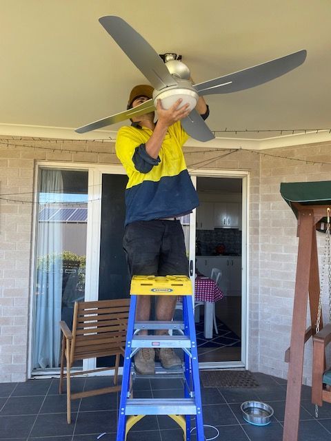 BES- Elect employee installing a ceiling fan