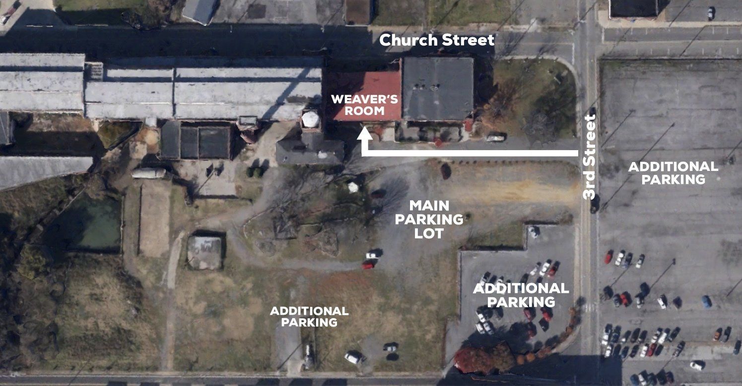 An aerial view of a parking lot with the words main parking lot on it