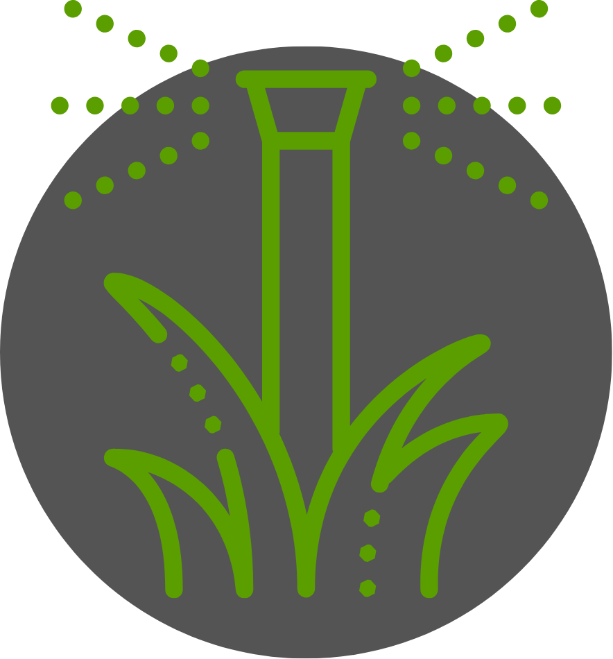 A sprinkler is spraying water on a lawn in a circle.