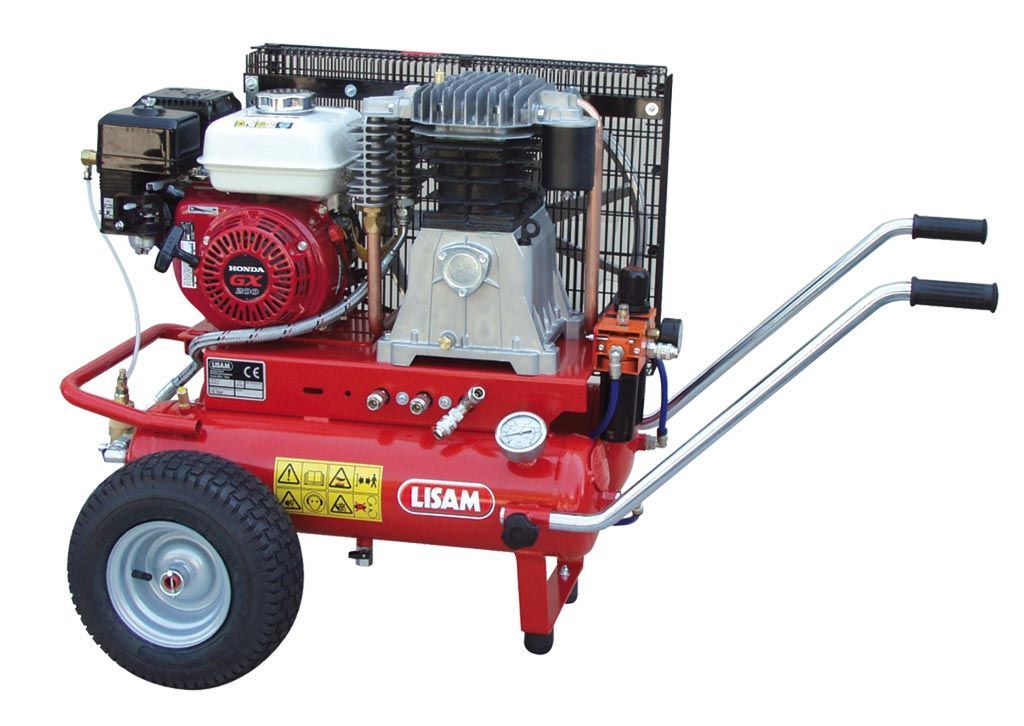 Un compressore d'aria rosso con un motore Honda è su un carrello.