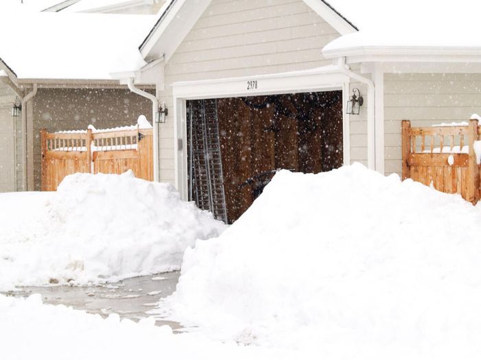 snow removal by a truck in anderson indiana during a snow storm