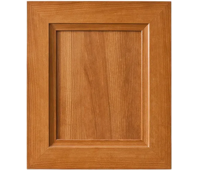 Wooden cabinet door panel with a raised rectangular frame and honey-brown finish