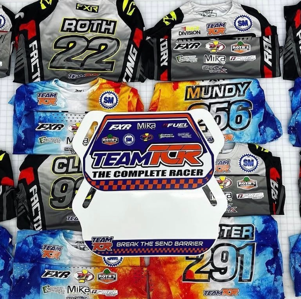 Team IKC The Complete Racer logo over a collage of colorful racing jerseys with sponsor names and numbers