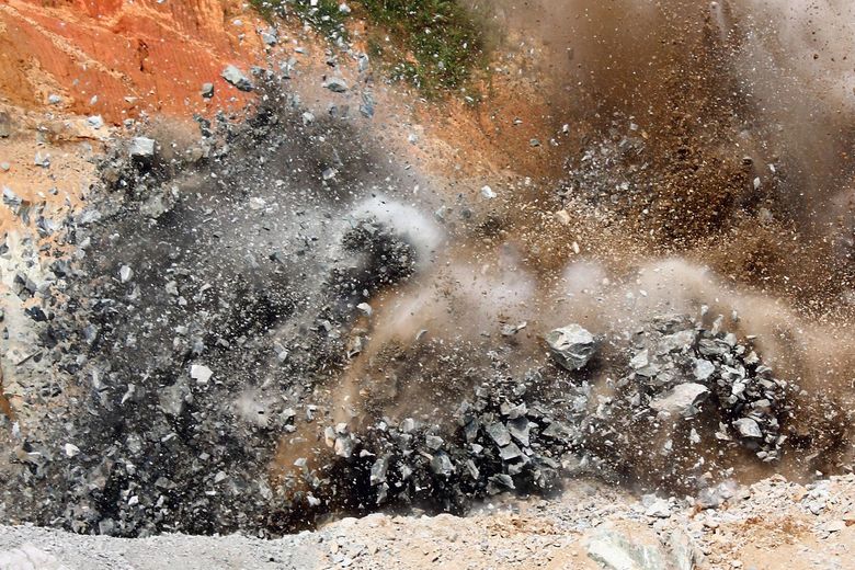 Blast in open cast mining quarry