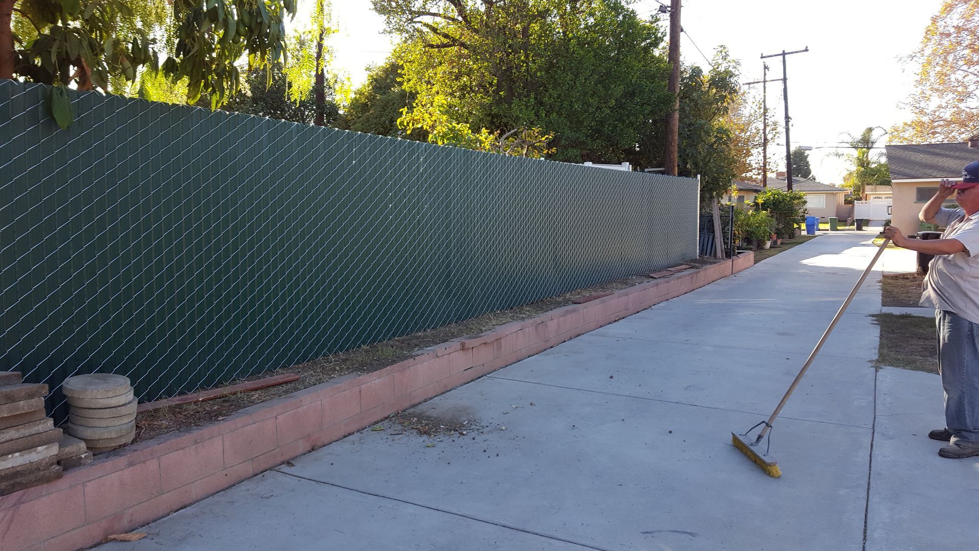 Chain-link privacy fence bordering a Los Angeles property