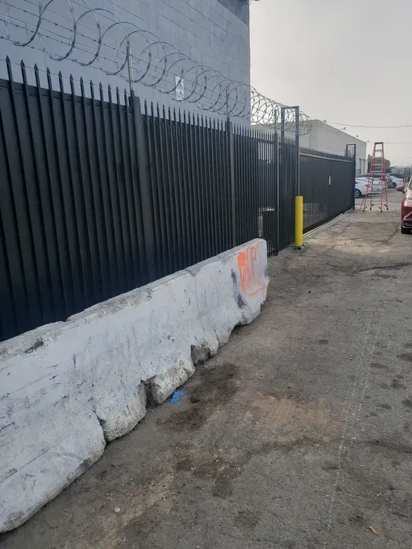 Wrought iron perimeter fence installed for a residential property