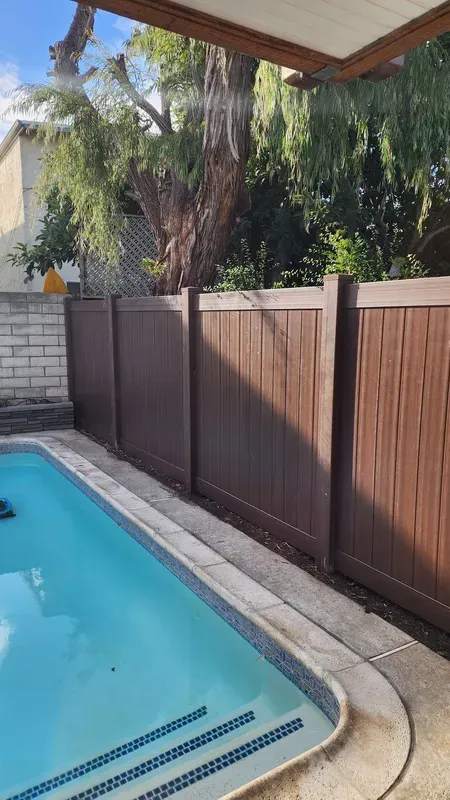 Vinyl privacy fence enclosing a Los Angeles backyard pool