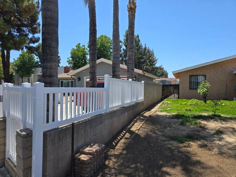 Vinyl fence and gate completed for a local client
