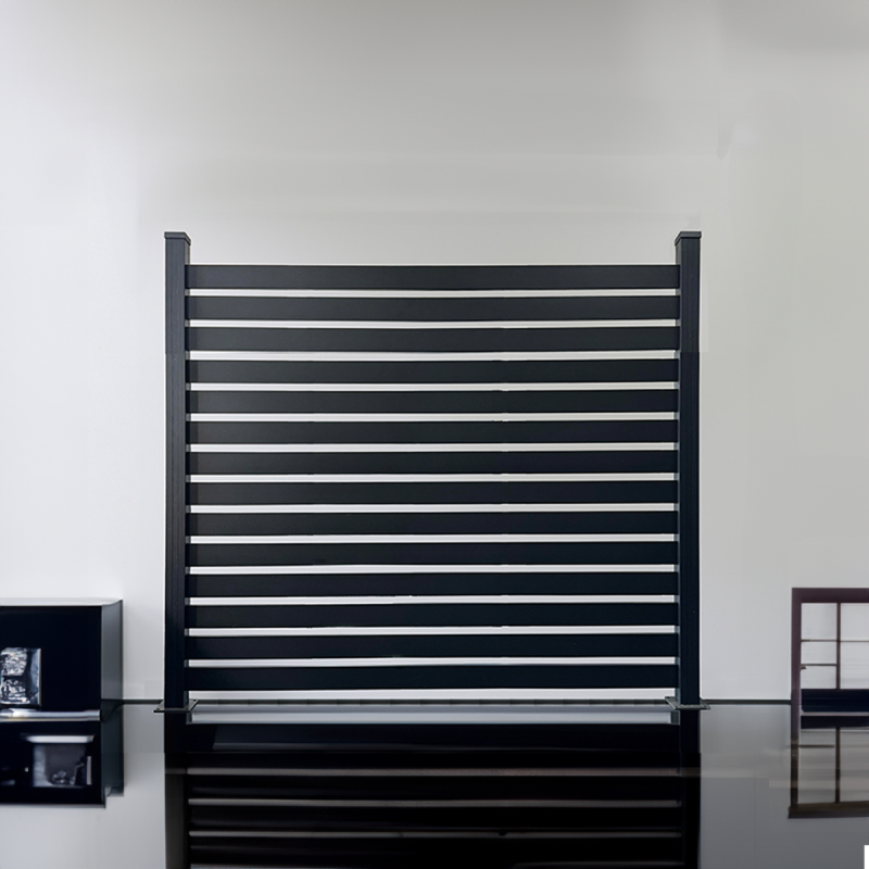 Tan composite fence panels enclosing a Southern California property