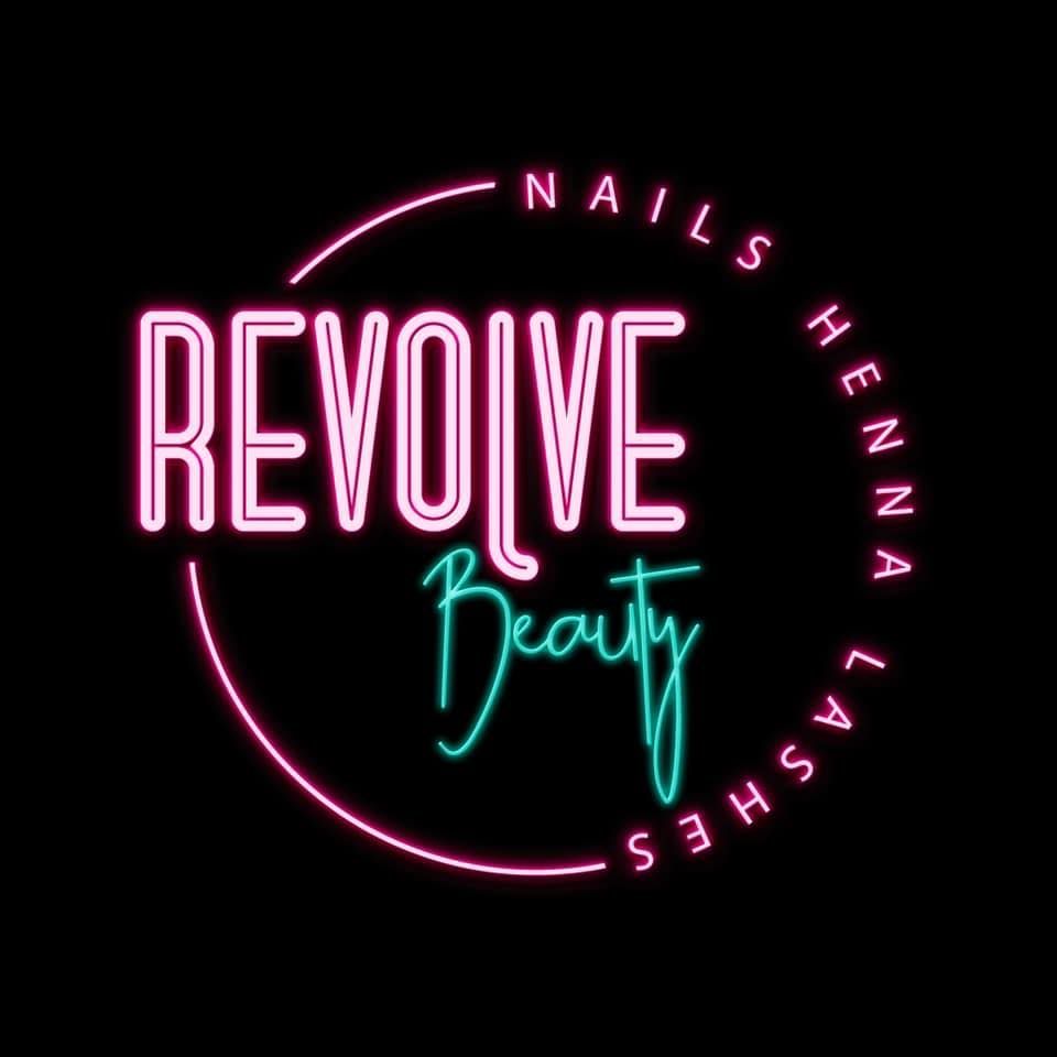 A neon sign for revolve beauty nails , henna , lashes.