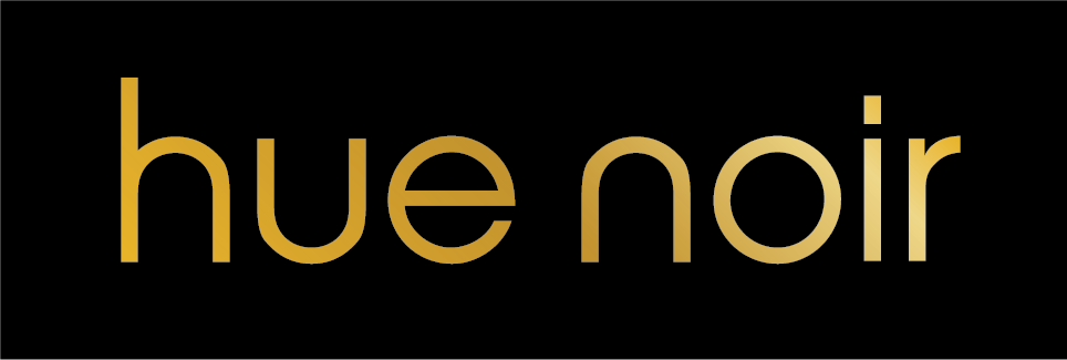 A black background with the word hue noir in gold letters