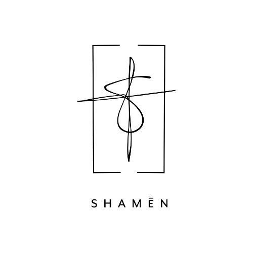 A black and white logo for shamen with a cross in the middle.