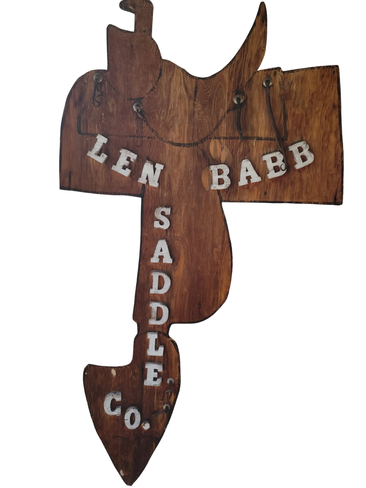 Wooden sign shaped like a fish, painted with “LEN BABB SADDLE CO.”
