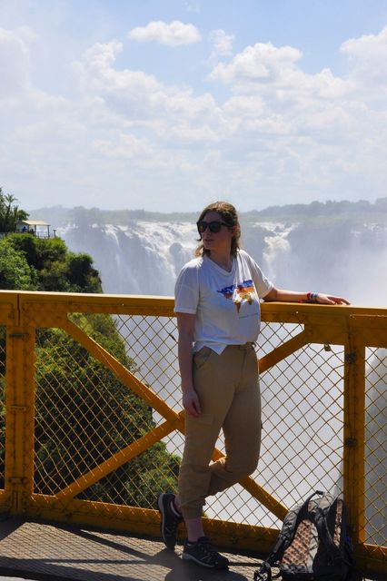 Laura Bornstein on Victoria Falls Bridge, overlooking the Victoria Falls, right at the border between Zambia and Zimbabwe