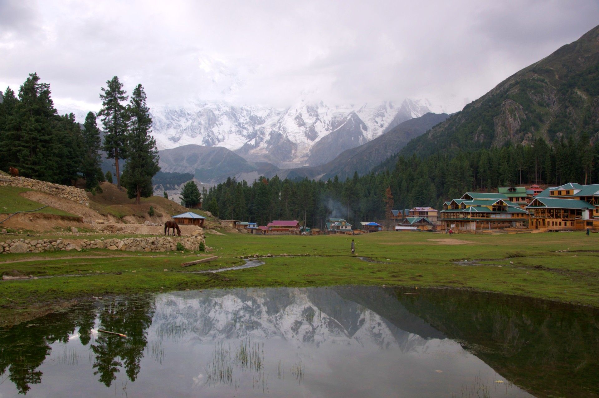 Nanga Parbat reflected on a lake in Fairy Meadows, Gilgit Baltistan, Pakistan
