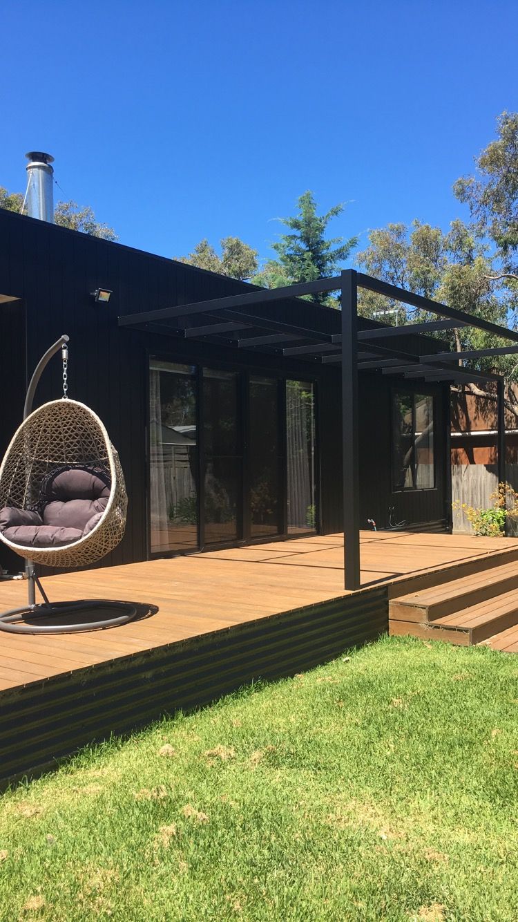 Black steel pergola & black minimal home