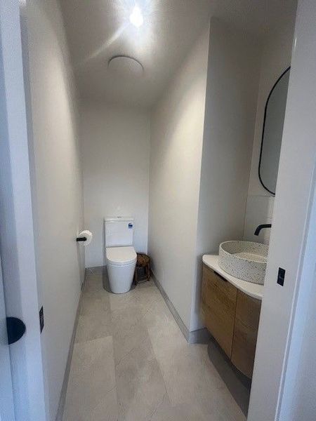 Powder room for guests, contemporary bathroom renovation completed by Peninsula Eco Constructions