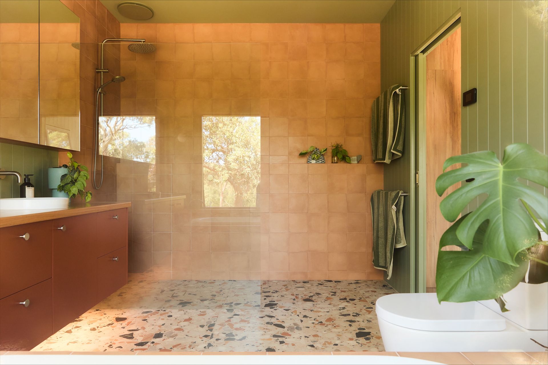 Bathroom in shoreham, terracotta tiles, green bathroom, high quality joinery