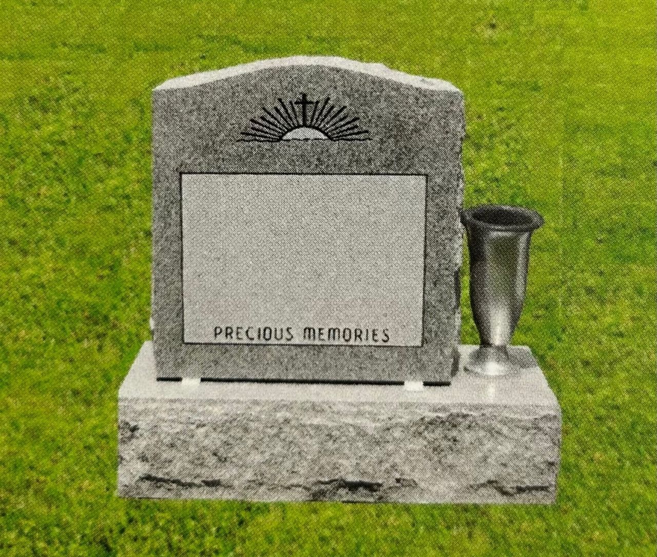 Gravestone with sunburst design and vase, set on grass. Engraved with 