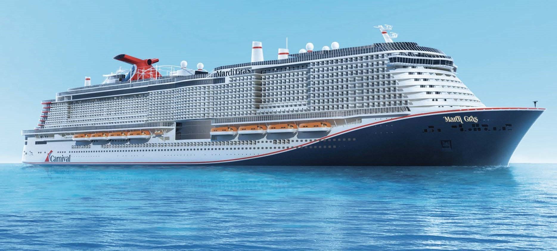 Large white and blue cruise ship sailing on calm open water under a clear sky