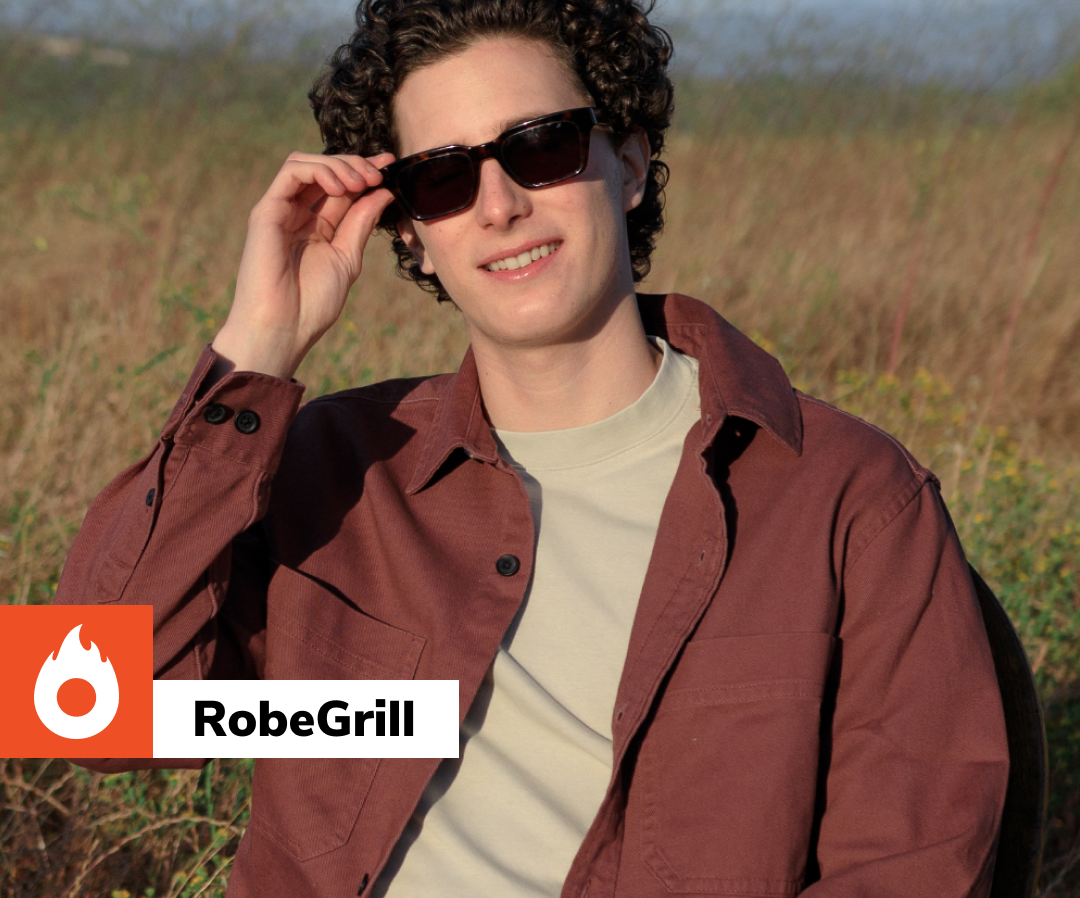 Um homem usando óculos escuros e um logotipo da robegrill