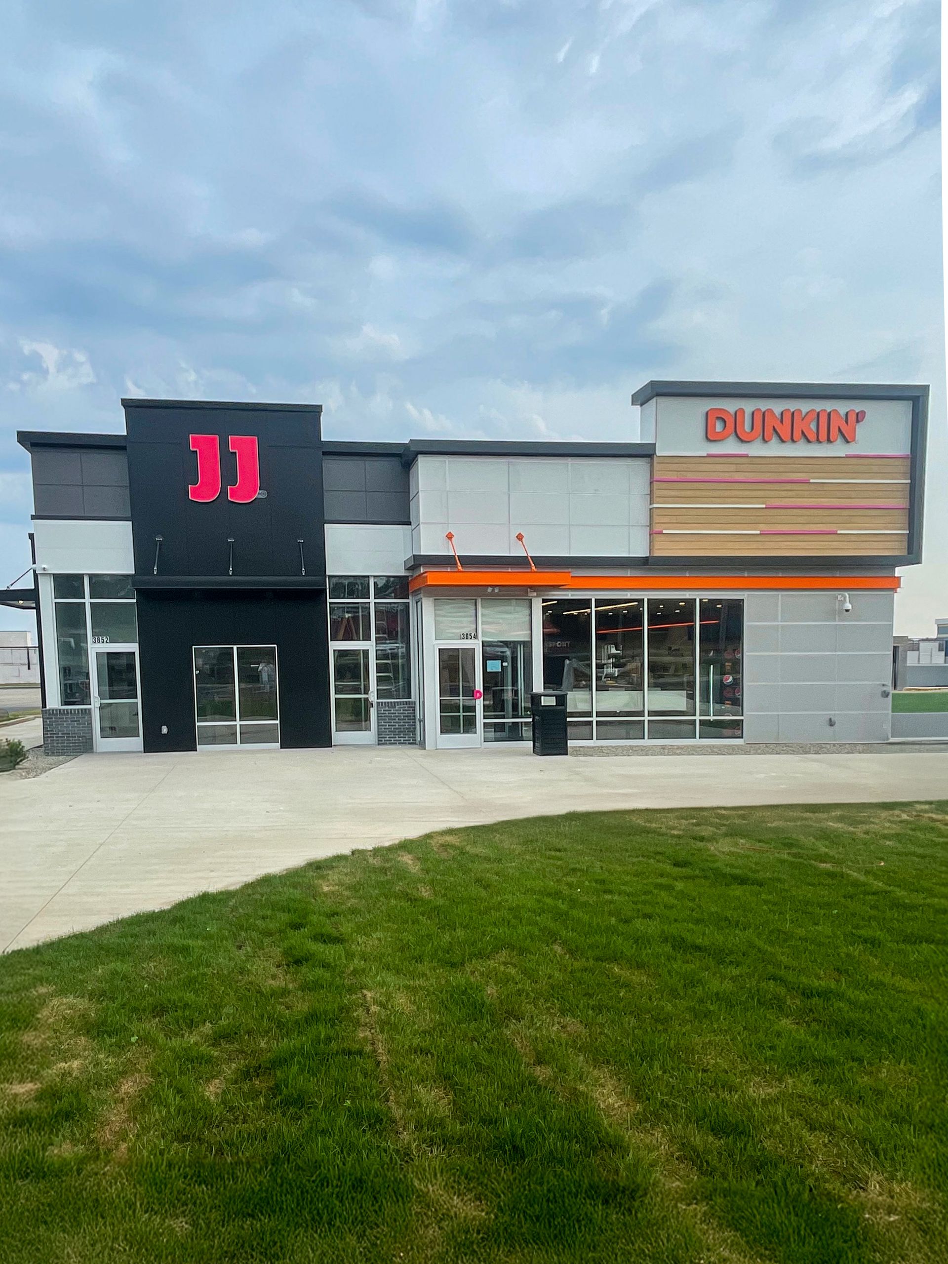 A commercial building featuring a black 