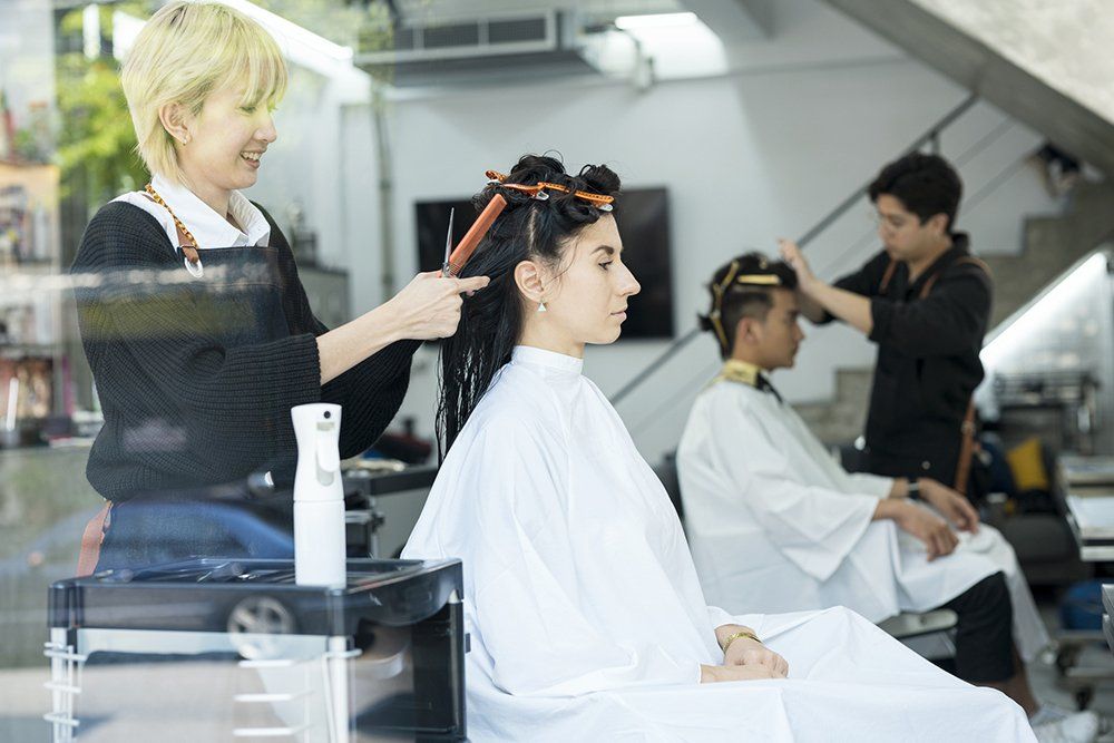 Clients Having their Hair Cut in Hair Salon | Cheyenne, WY | City Barbers & Stylists