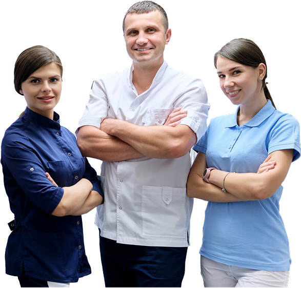 A young boy is brushing his teeth while holding a paper tooth.