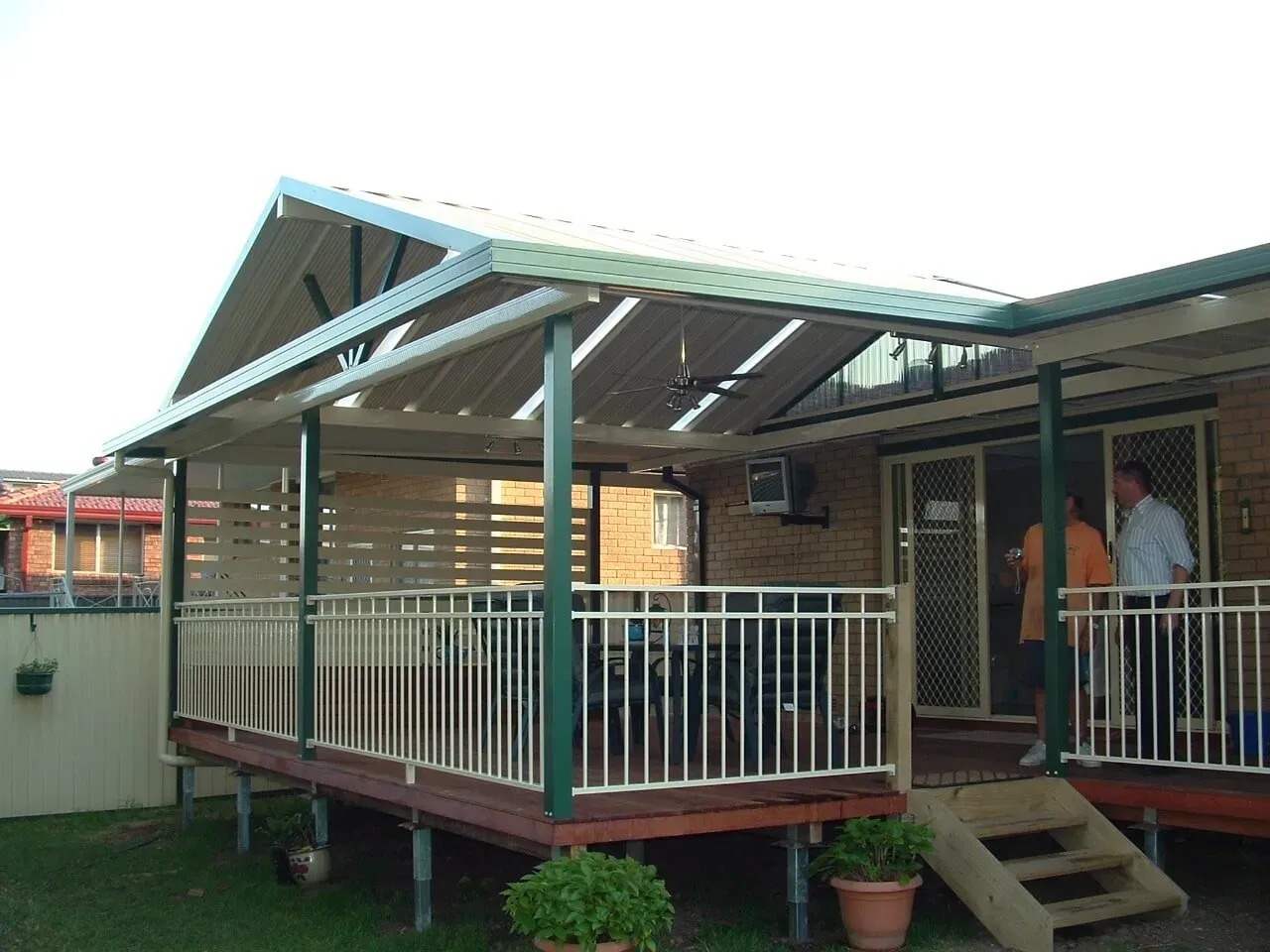 A house with a covered deck and stairs — Hunter & Mid Coast Patios In Forster-Tuncurry, NSW
