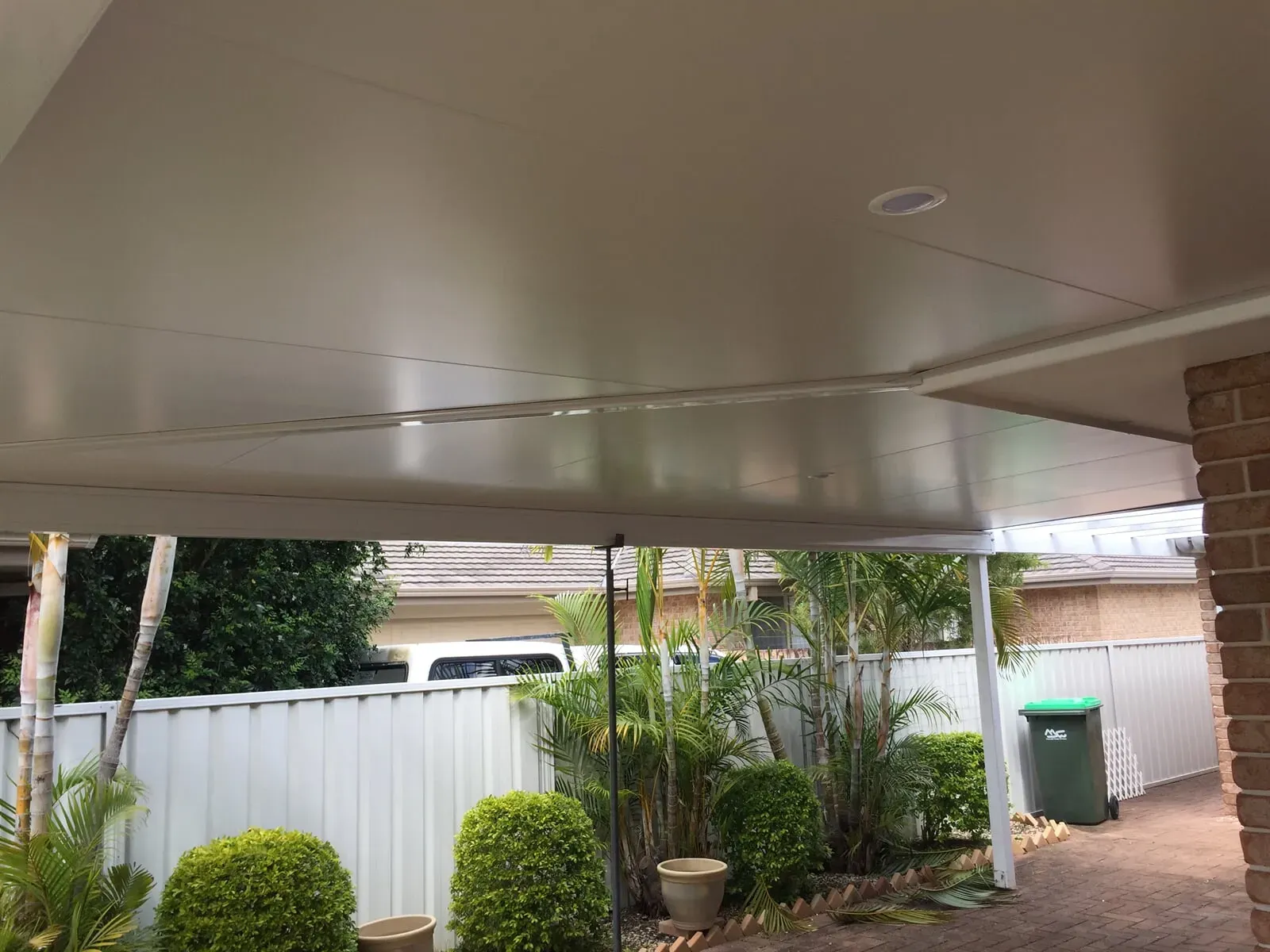 There is a carport in the backyard of a house. — Hunter & Mid Coast Patios In Hamilton, NSW