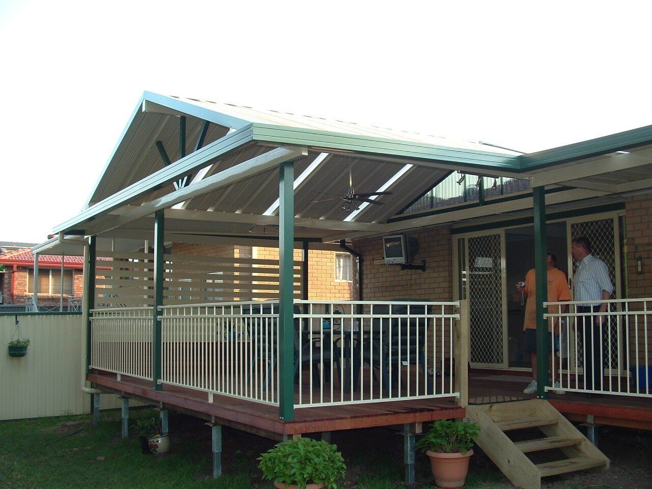 A House With a Large Deck and Stairs Leading Up to It — Hunter & Mid Coast Patios In Newcastle, NSW