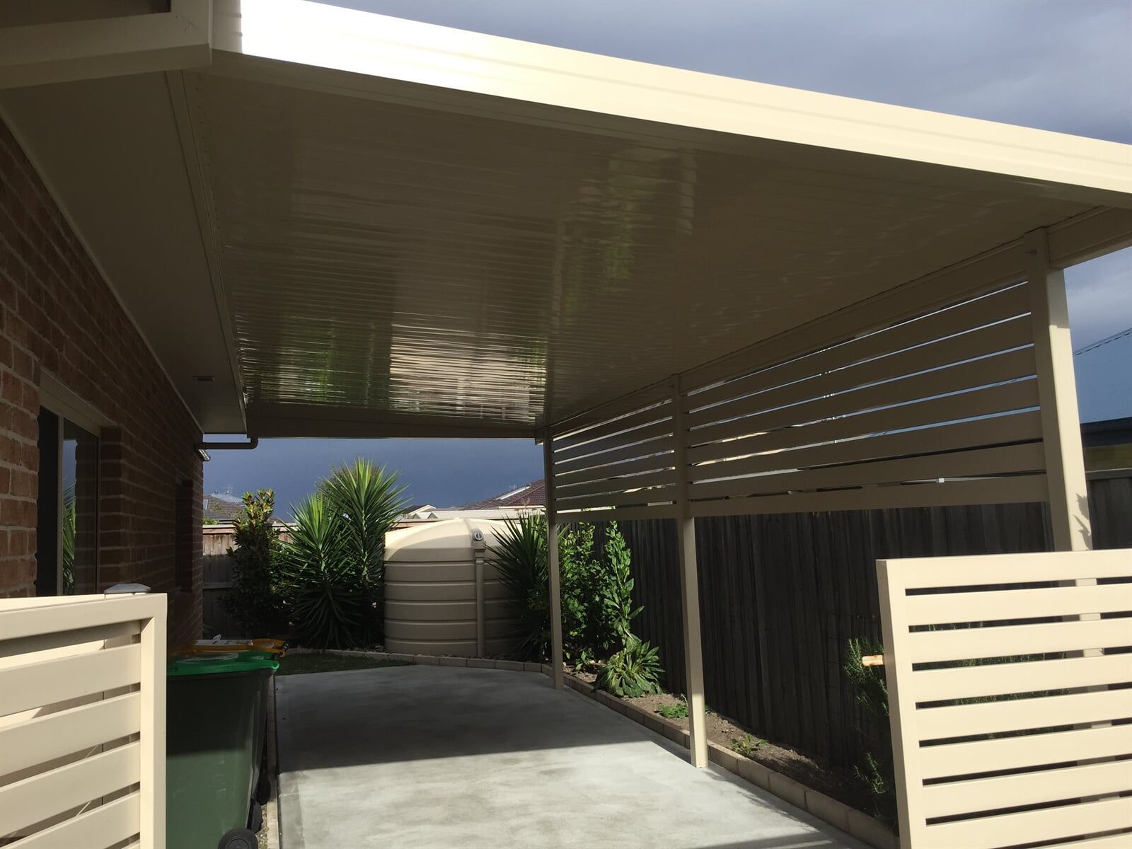 A House With a Large Deck and Stairs Leading Up to It — Hunter & Mid Coast Patios In Port Stephens, NSW