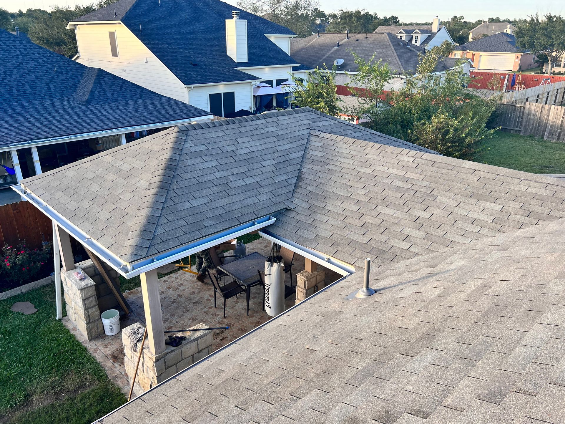 Overhead view of a gray-roofed patio structure add-on