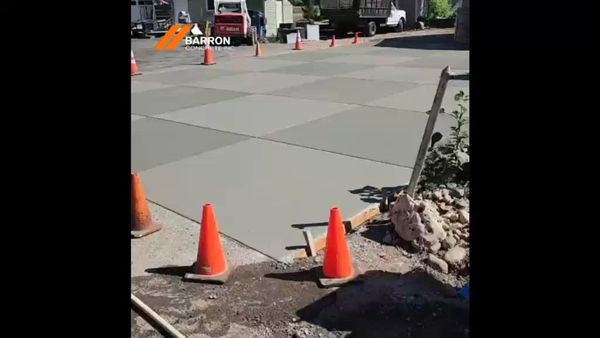 Video thumbnail: concrete driveway installation with checkerboard finish