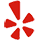 The Yelp logo, featuring a red, starburst-like asterisk symbol consisting of five stylized, petal-shaped segments.