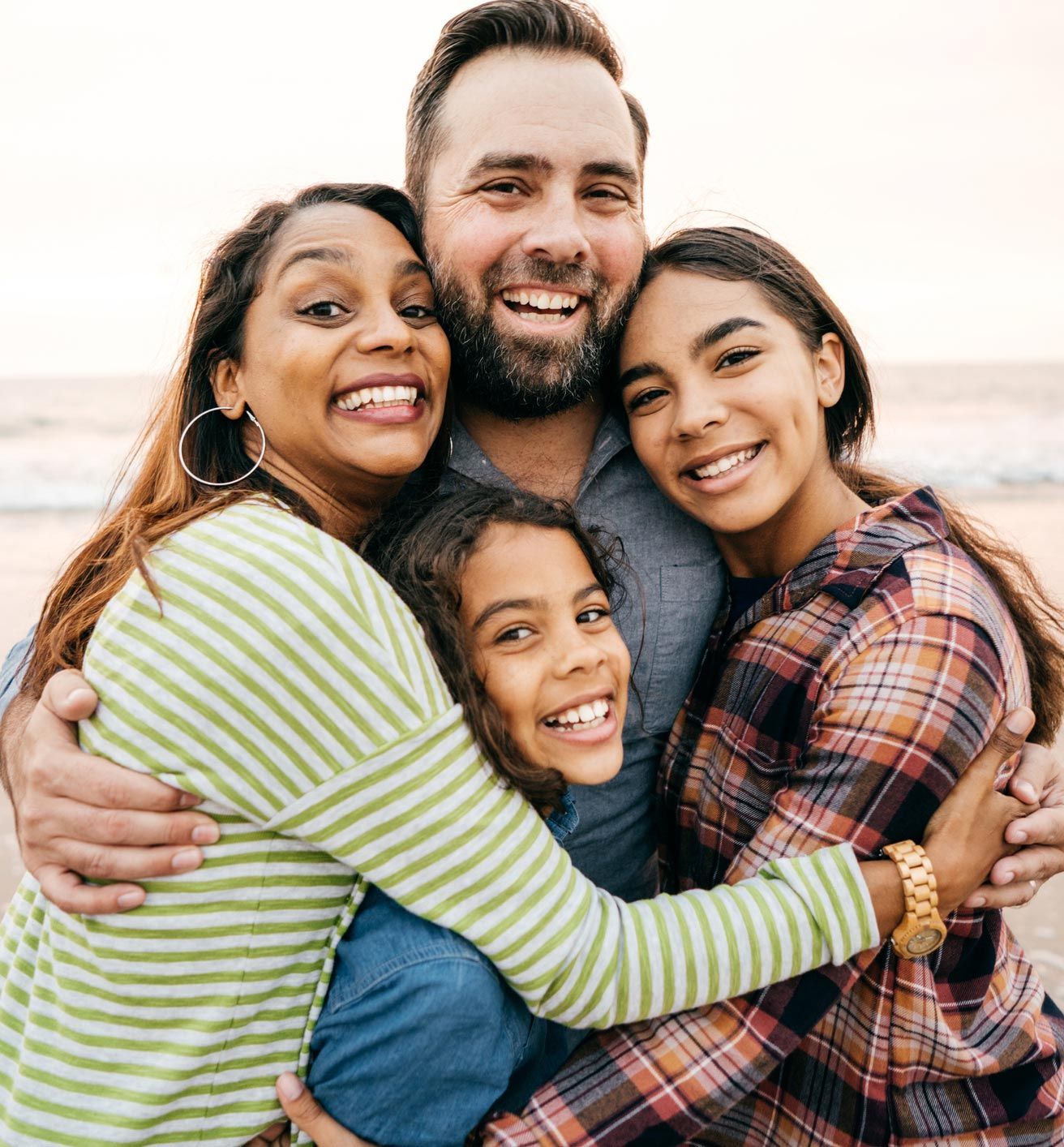 Family Hugging Together — Oak Forest, IL — The Genesis Therapy Center Family Hugging Together — Oak Forest, IL — The Genesis Therapy Center