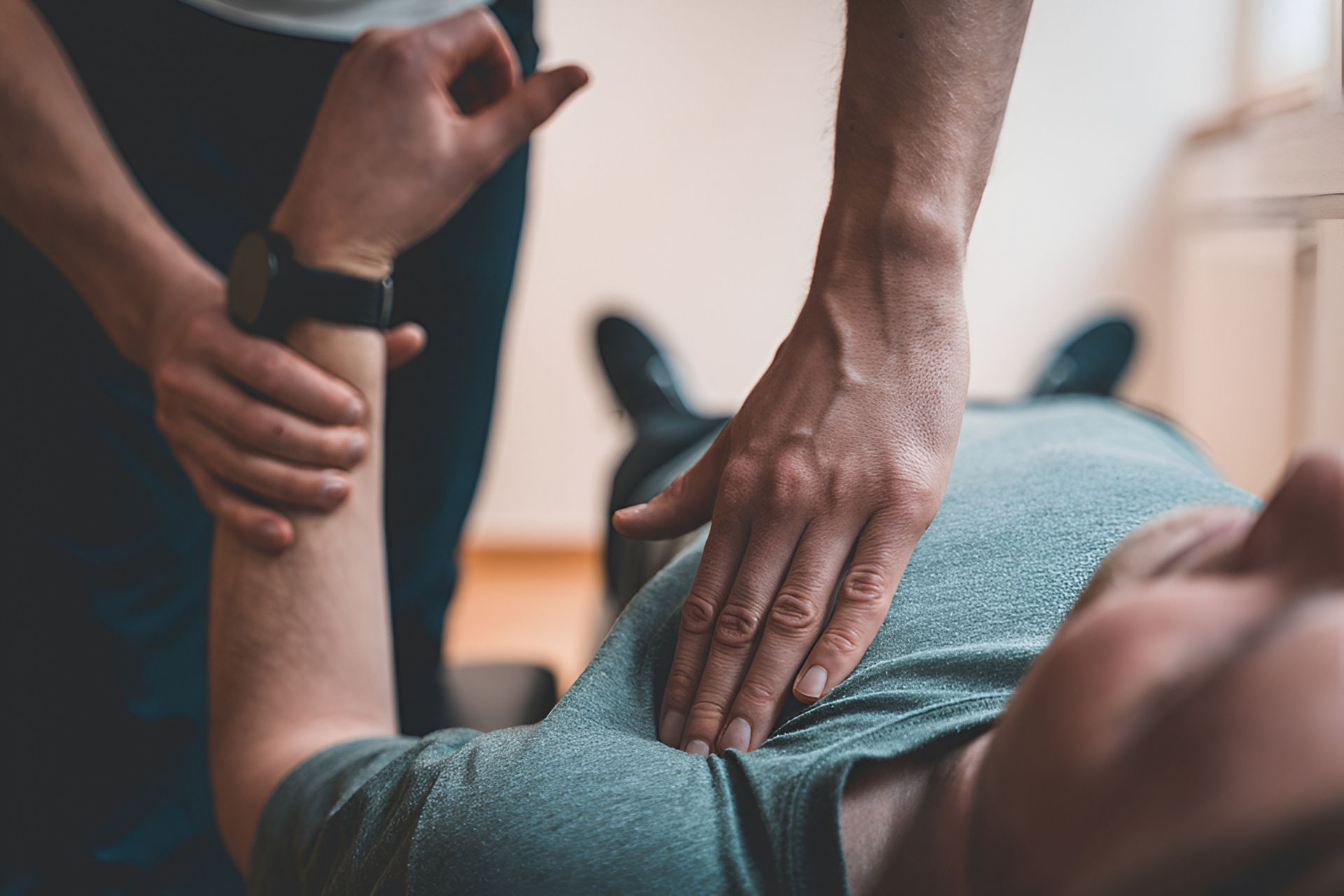 Person Receiving Shoulder Therapy — Dive Chiropractic in Mermaid Beach, QLD