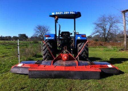 Blue Tractor with Slashing Machine on Their Back | Sydney Nsw  | Agritract