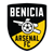 Benicia Arsenal FC logo: Black shield with yellow diagonal split. White text "BENICIA" above and "ARSENAL FC" below. Central cannon with soccer ball.