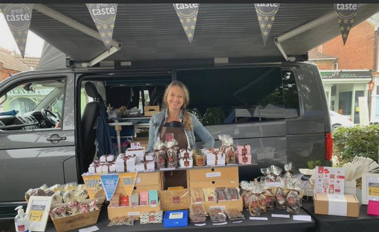 Linny at her market stall in woburn sands