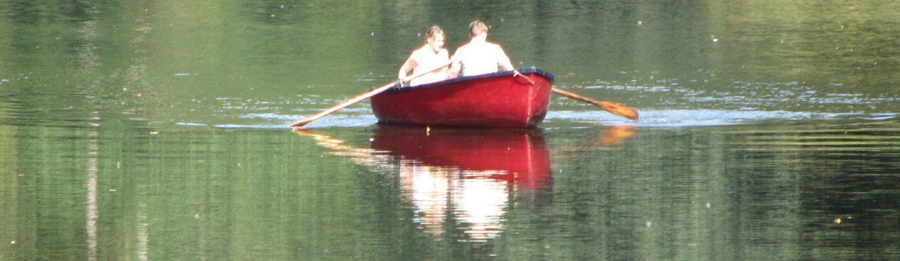 Two People Rowing a Boat — Tampa, FL — Gegan Law Office Two People Rowing a Boat — Tampa, FL — Gegan Law Office