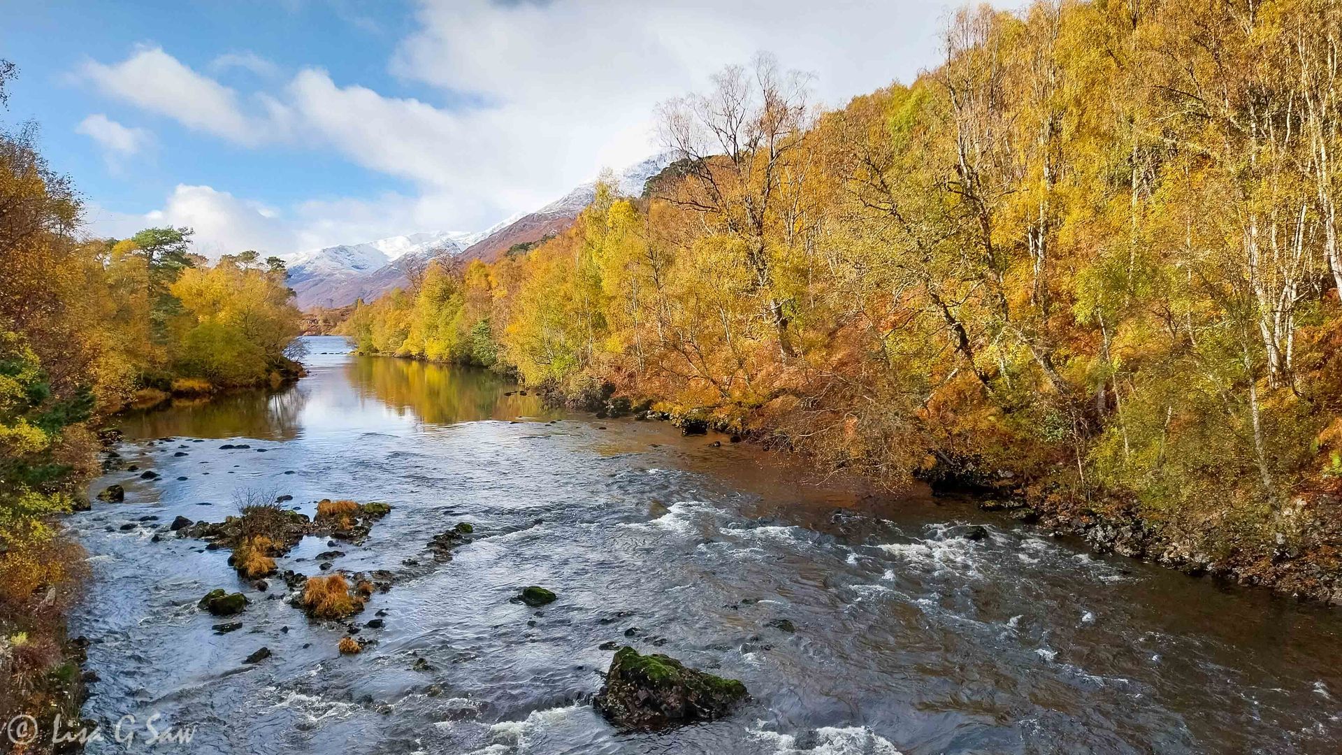 Garbh-uisge leading to Glen Affric and snow capped mountains