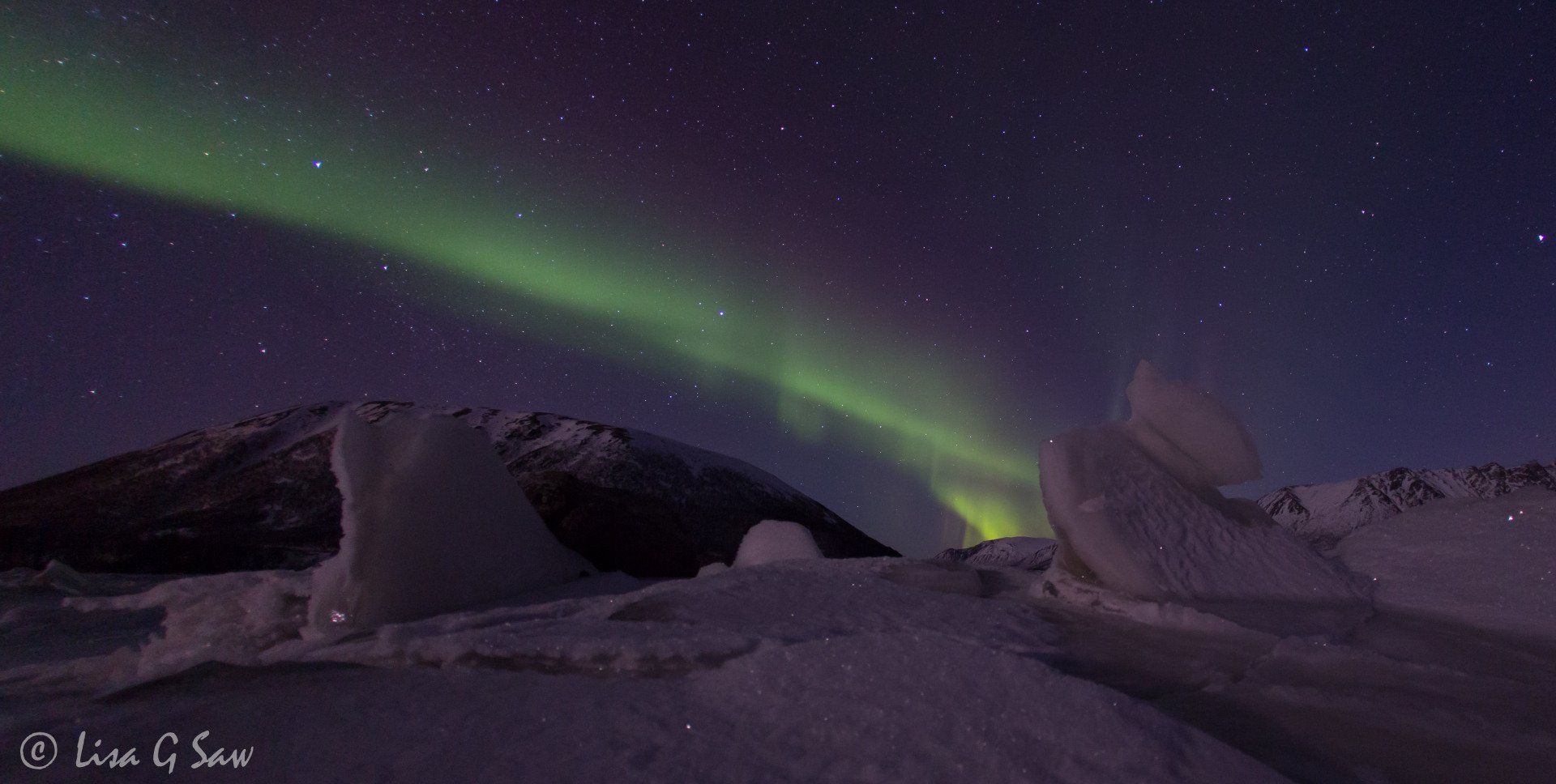 Northern Lights strobe from block of ice, Norway