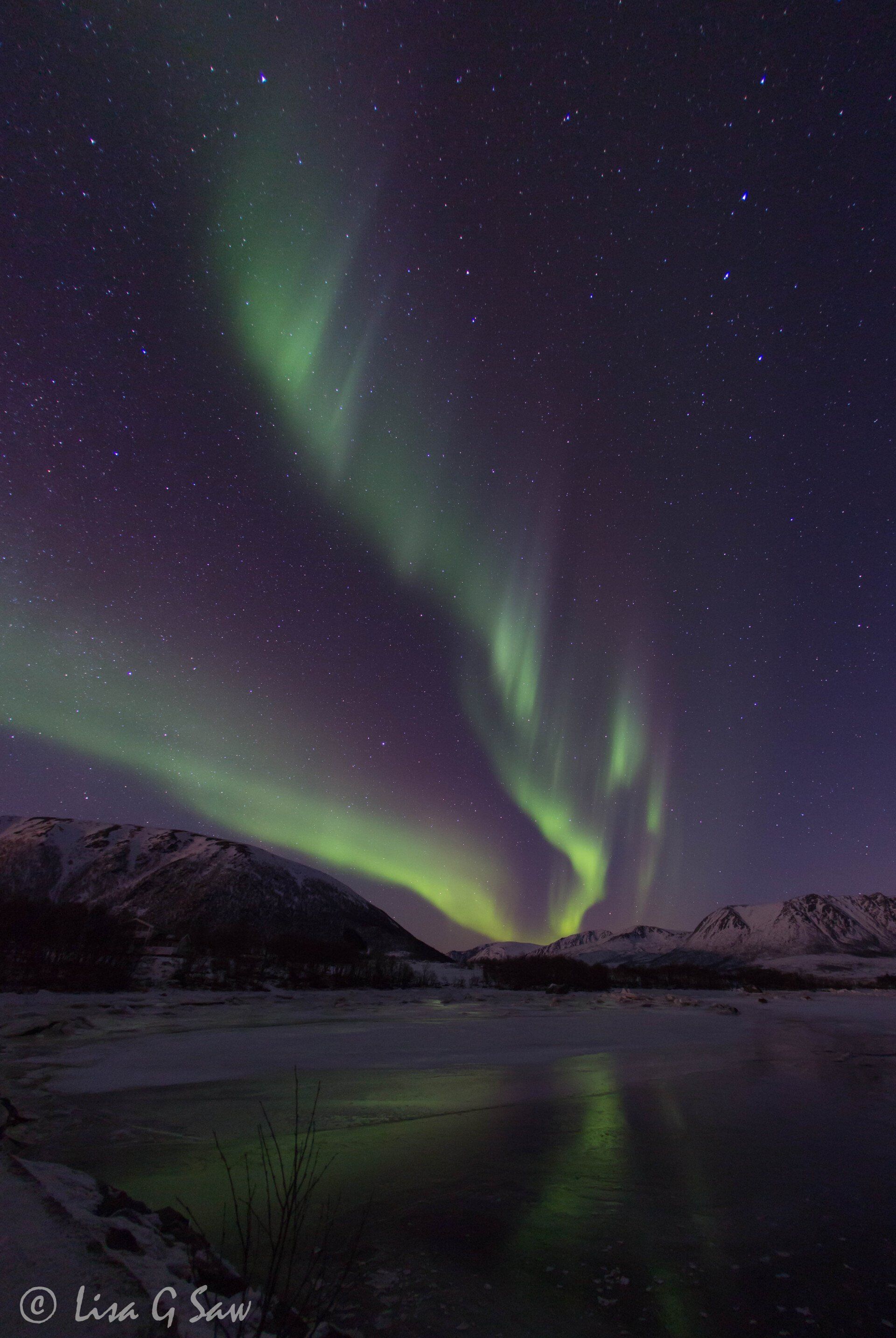 Northern Lights reflecting on water, Norway