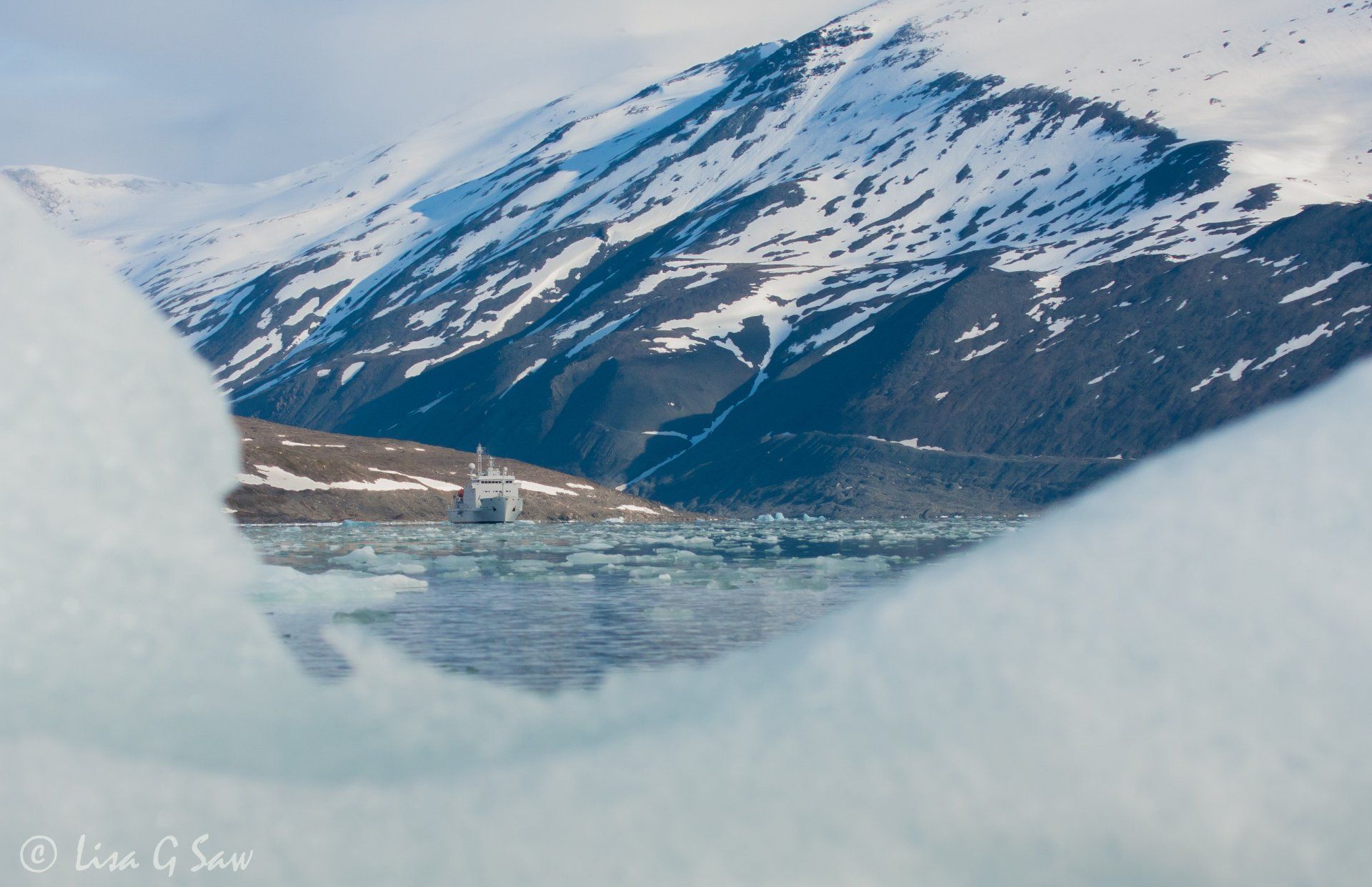 Vavilov ship with iceberg natural frame in foreground