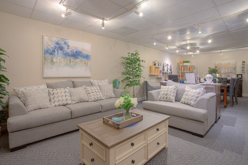 A living room with two couches and a coffee table.