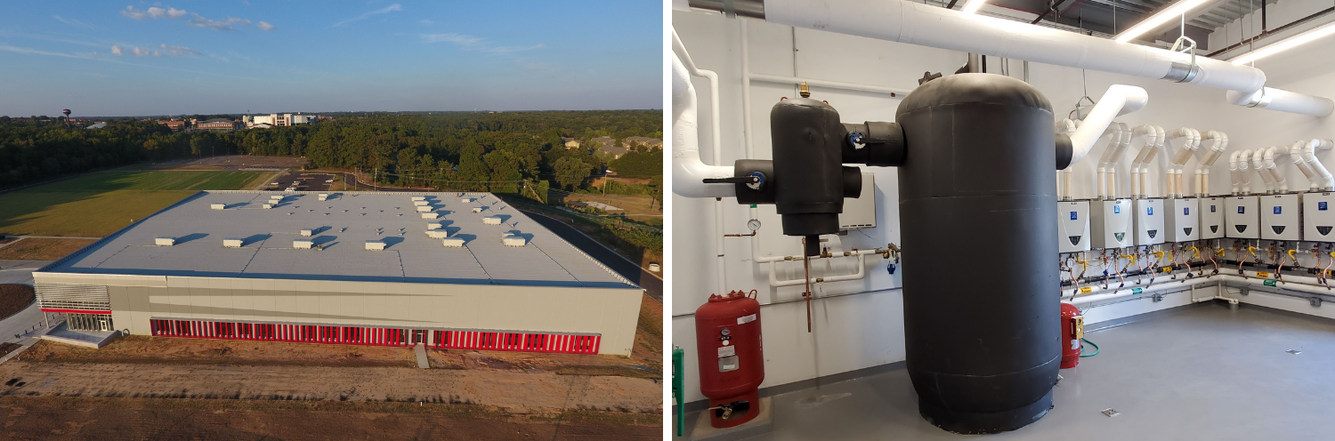 Industrial facility with rooftop vents and an indoor row of large black tanks and piping